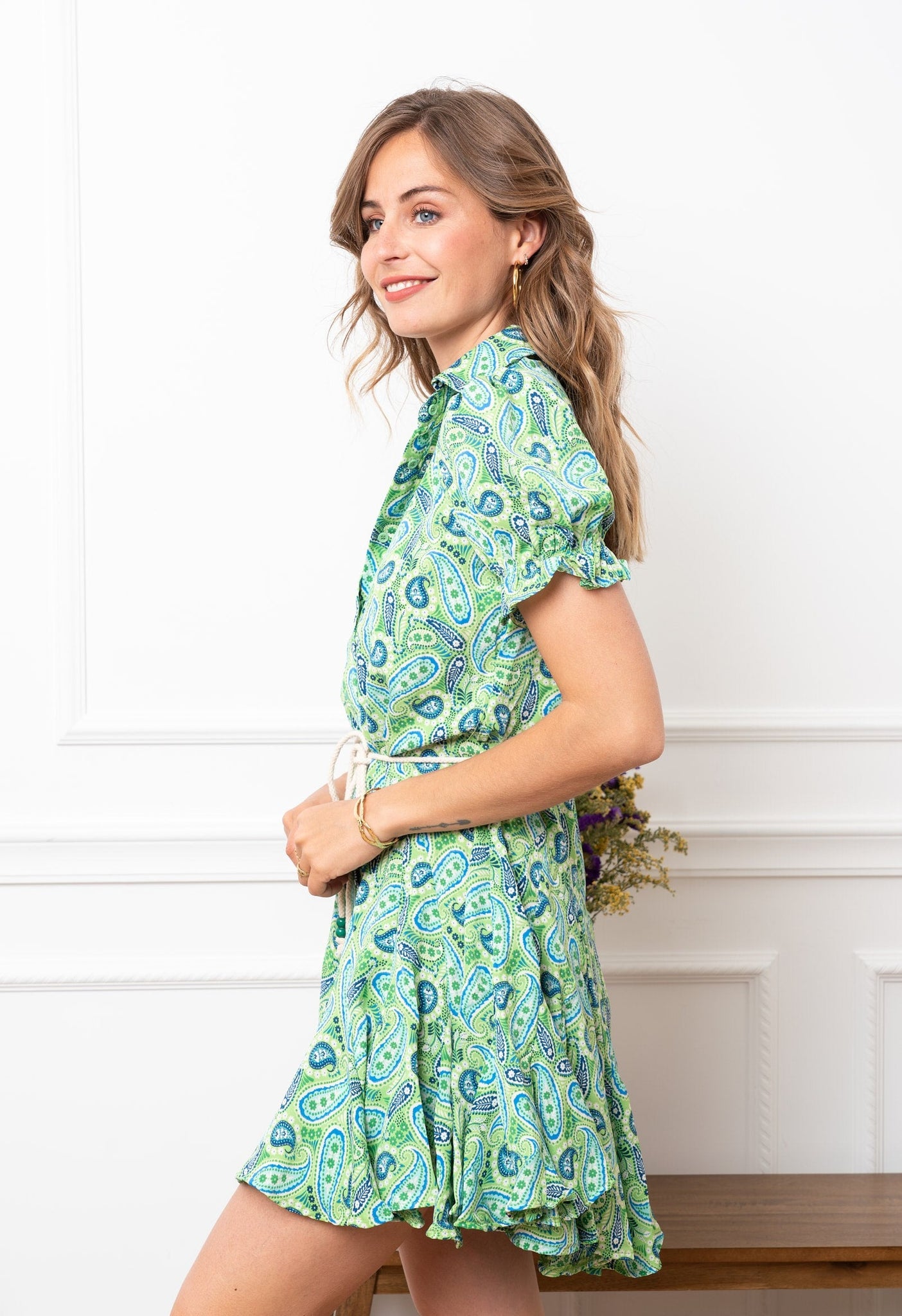 Green printed belted dress.
