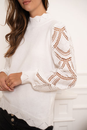 Jumper with lace sleeves