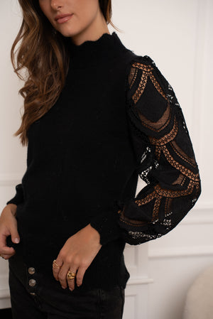 Jumper with lace sleeves